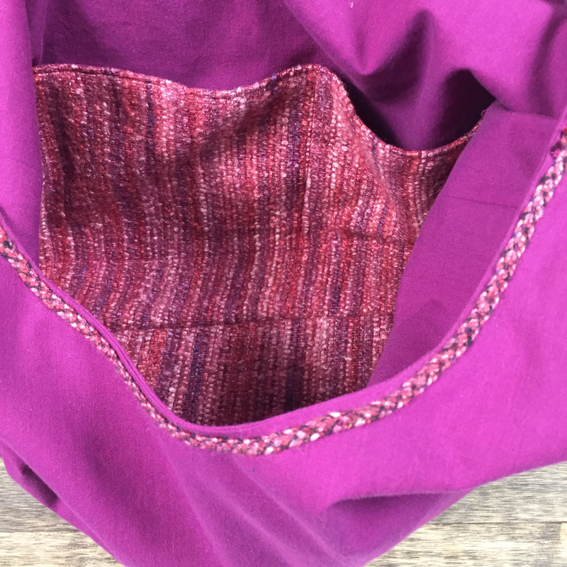 thefibersprite's medium tote inside view of handwoven pockets